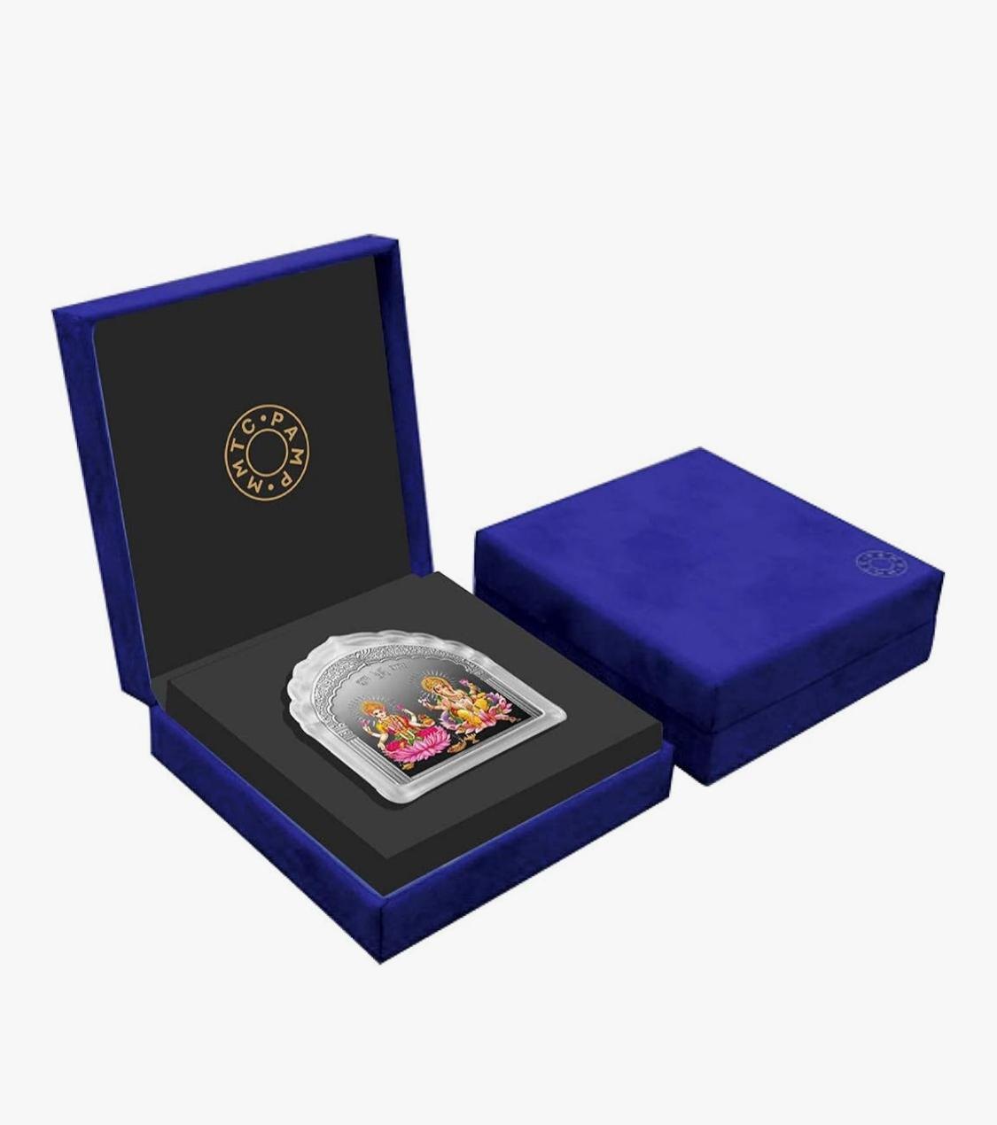 Silver idol with velvet display case by Rajat Prabha